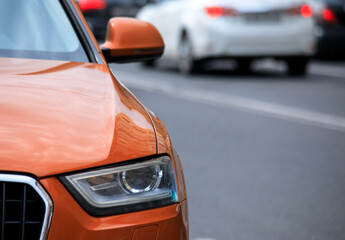 Wall Mural - orange car in street