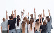 © ASDF - large team of young people pointing somewhere up .