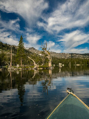 Canvas Print - Kayak and cloud reflection, Upper Echo Lake and Ralston Peak near South Lake Tahoe, California, USA.