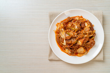 Wall Mural - stir-fried pork with Korean spicy paste and kimchi