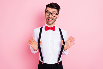Wall Mural - Photo of nice impressed brown hair guy wear spectacles white shirt isolated on pastel pink color background