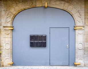 Canvas Print - old letterbox at a door