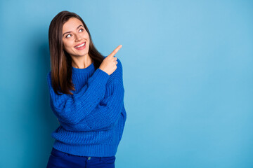 Wall Mural - photo of young happy excited positive lovely pretty girl smiling look point finger copyspace isolate