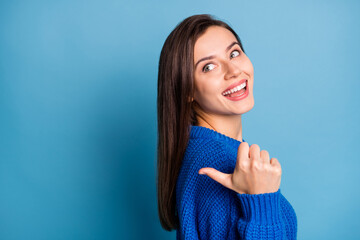 Wall Mural - profile side photo of young happy excited positive lovely girl smiling point thumb in copyspace isol