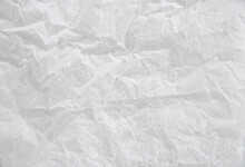 White crumpled sheet background,wrinkled baking sheet,cintage backdrop.