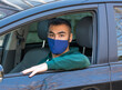 © kasperok32 - health protection, safety and pandemic concept,taxi driver.