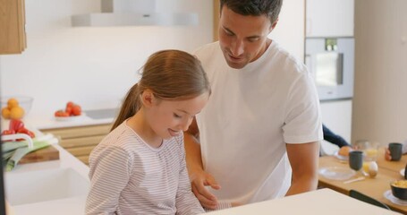 Poster - Dad and daughter using
a tablet
