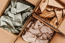 Cardboard Boxes With Crumpled Paper Inside For Packaging Goods From Online Stores, Eco Friendly Packaging Made Of Recyclable Raw Materials