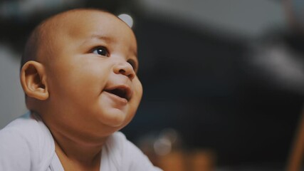 portrait of cute african american black baby having tummy time. high quality 4k footage