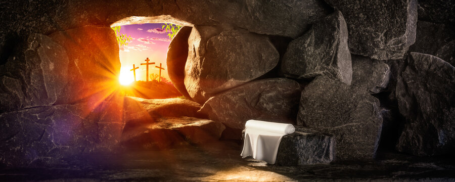 empty tomb with linen cloth at sunrise with sunlight shining through the open door and three crosses