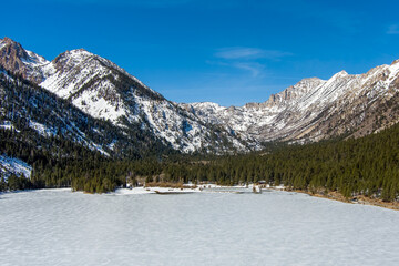 Poster - Aerial view of Twin Lakes California covered with snow and ice during winter.