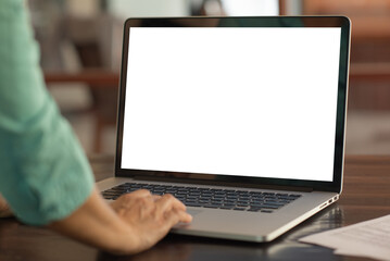 Wall Mural - blank white desktop screen computer with women using laptop computer mockup.