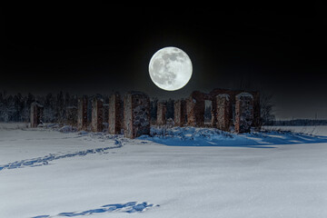 Wall Mural - Full Moon Night Ancient Ruins in a Frozen Winter Snow Covered Field in Latvia