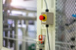 © Nay - View of emergency switch on safety fence of machine