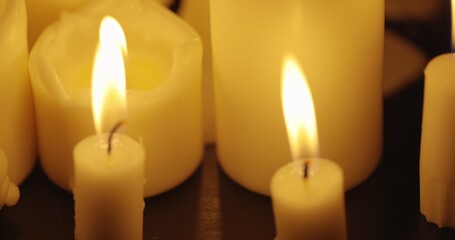 Wall Mural - Candles on table closeup photo