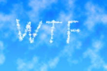 Text Wtf Written In Sky. Letters Made Of Clouds Or Contrails. Ecology Concept.