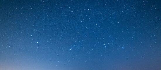 Wall Mural - beautiful blue starry sky. night photography, astronomical background.