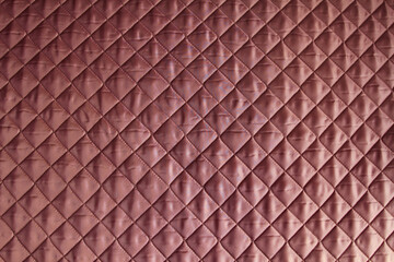 fashionable quilted fabric in cocoa color. abstract background