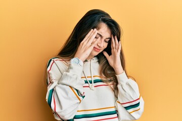 Poster - Young caucasian woman wearing casual clothes with hand on head, headache because stress. suffering migraine.