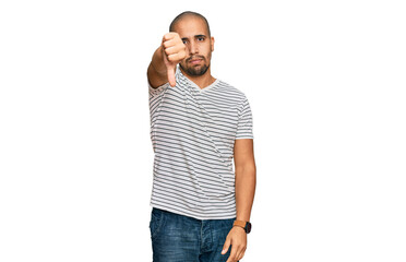 Sticker - Hispanic adult man wearing casual clothes looking unhappy and angry showing rejection and negative with thumbs down gesture. bad expression.