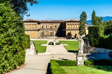 Wall Mural - Exterior view of the back façade of Pitti Palace, facing the amphitheatrum, seen from Boboli Gardens, Florence, Tuscany region, Italy