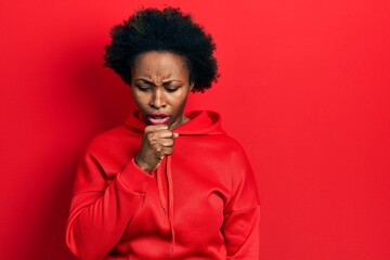 Wall Mural - Young african american woman wearing casual sweatshirt feeling unwell and coughing as symptom for cold or bronchitis. health care concept.