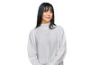 © Krakenimages.com - Young brunette woman with bangs wearing casual turtleneck sweater looking away to side with smile on face, natural expression. laughing confident.