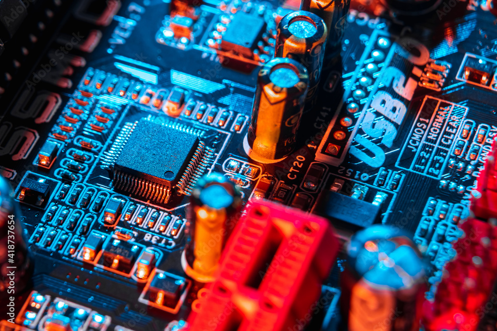 Electronic components on a printed circuit board. Resistor, inductor and capacitor on PCB. Concept Electrical engineering, microprocessor, technology. Selective focus.
