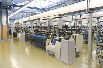 Factory for the production of threads and fabrics