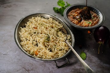 Wall Mural - Bagara Baingan served with Bghare Rice - Hyderabadi Eggplant Curry