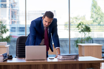 Young businessman employee working in the office