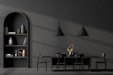 Long black dining room table with wooden chairs standing in a dark flat. The bookshelf in the wall. 3d rendering mock up