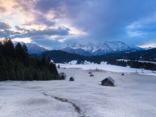Wall Mural - frosty pinkish sunrise at lake gerold in the karwendel mountains