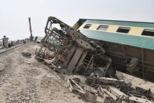 Shows A Derailed Train In Sukkur District Of, Pakistan. A Woman Was Killed And Over 25 Others Were Injured When Nine Out Of 18 Compartments Of A Passenger Train Derailed In Sukkur District