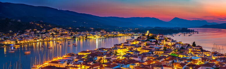 Canvas Print - Panoramic view of greek town Poros at sunset, Greece