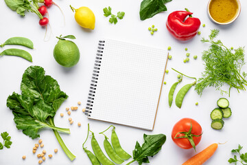 Canvas Print - Blank notepad with ingredients for preparing tasty and healthy food on white background