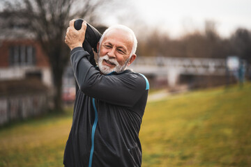 Active senior man is exercising. Healthy retirement lifestyle.