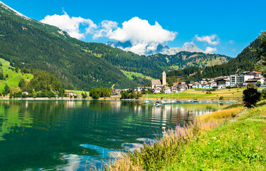 Sticker - Reschen am See or Resia, a village on Lake Reschen in South Tyrol, Italian Alps