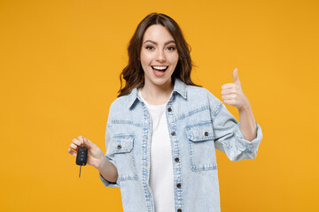 young smiling happy satisfied excited successful lucky brunette woman 20s in denim shirt white t-shi