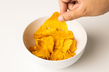 Crispy mexican nachos chips salty.Snacks Fast food or junk food snacks unhealthy concept.