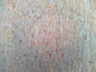 Colored rusty stained metal wall texture pattern