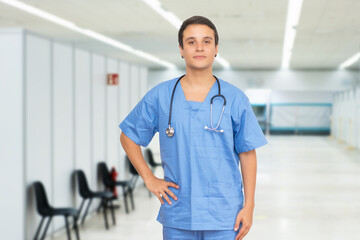 Young caucasian male nurse at vaccination station is ready for vacinating patients against coronavirus infection