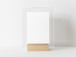 © Washdog - Vertical rectangle white menu with transparent frame on a light wood stand. Card display promotion and information for customer, picture stand,sign holder and photo frame template. 3D illustration
