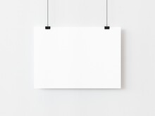 One Blank Horizontal Rectangle Poster Template Hanging On Thread With Paper Clips On White Background. 3D Illustration
