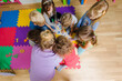© oksix - Educational group activity at the kindergarten or daycare