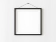 © Washdog - One square blank picture frame for photographs. Black picture frame mockup. Isolated picture frame mockup template on white background. 3D illustration