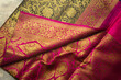 flat lay red silk saree