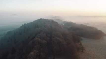 Wall Mural - Asphalt Road at Hazy Sunrise in Rural England