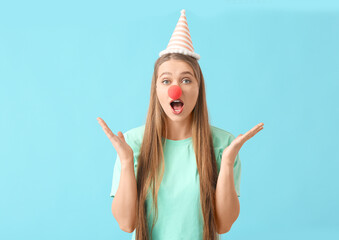 Poster - Young woman in funny disguise on color background. April Fools Day celebration