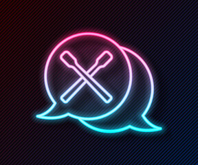 Glowing neon line Drum sticks icon isolated on black background. Musical instrument. Vector.